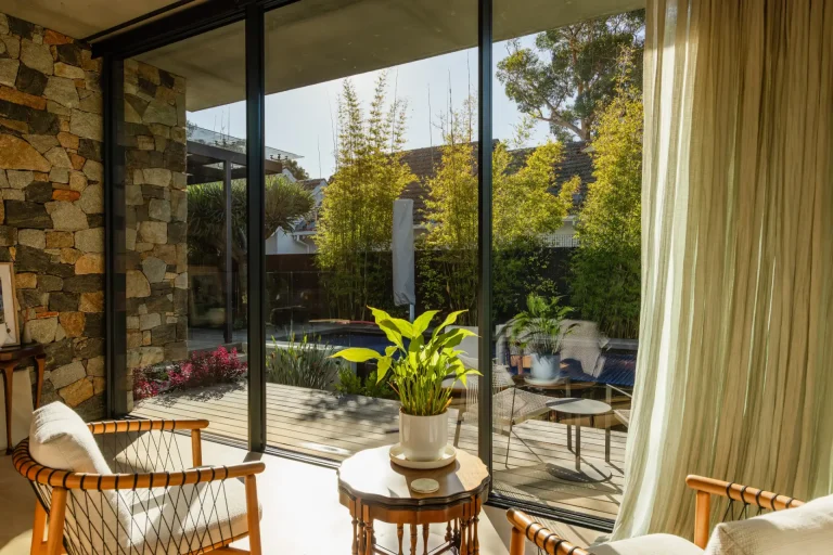 Living room glass doors with streak-free views of a sunny Perth garden